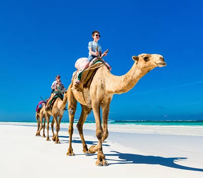 Family-safari-holidays-Diani-camel-ride
