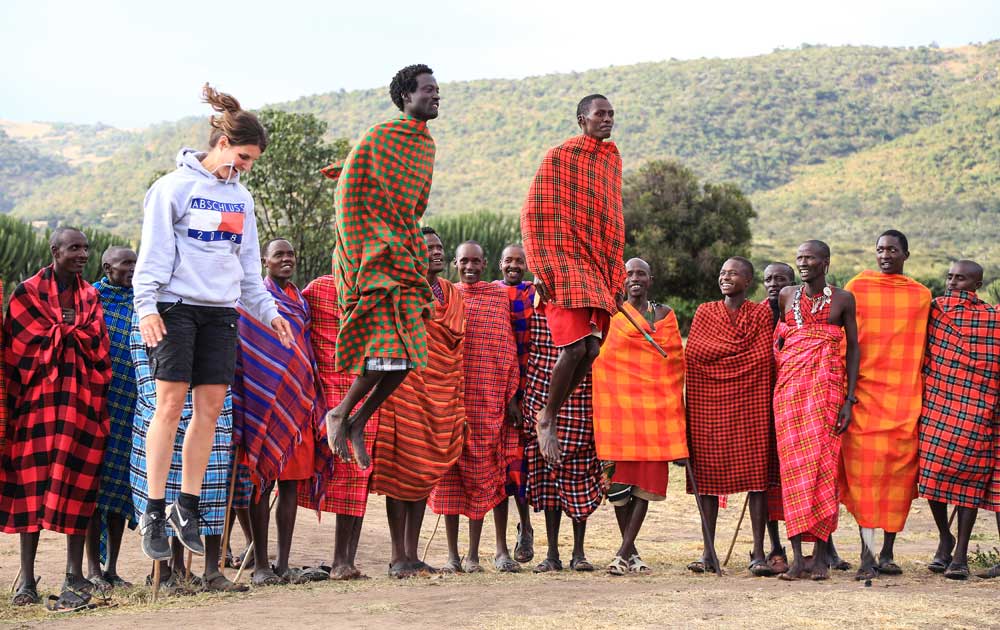 Male Maasai in traditional Shuka clothing with spear, Tsavo West